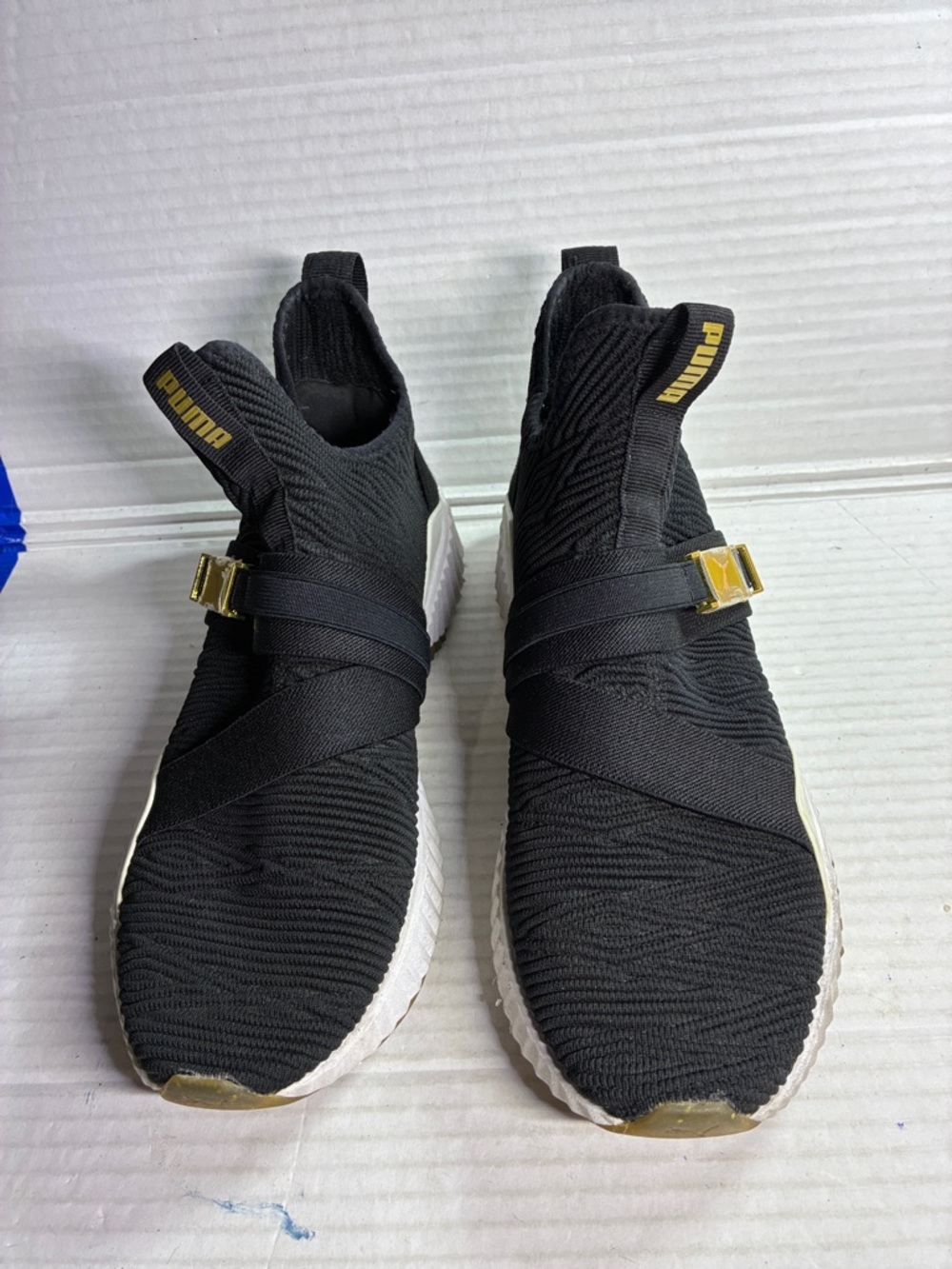 Puma Black Knit Slip-On Sneakers with Gold Accents USED